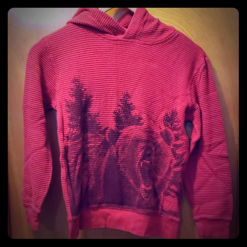 Red thermal shirt with drizzly bear design